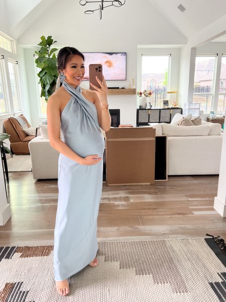 Stunning formal maxi dress! Love the halter neckline and open back. Sized up to a small to accommodate the bump, but would say it fits slightly larger  The color is so pretty in person and would look great for wedding guest outfit! 

#LTKstyletip #LTKwedding