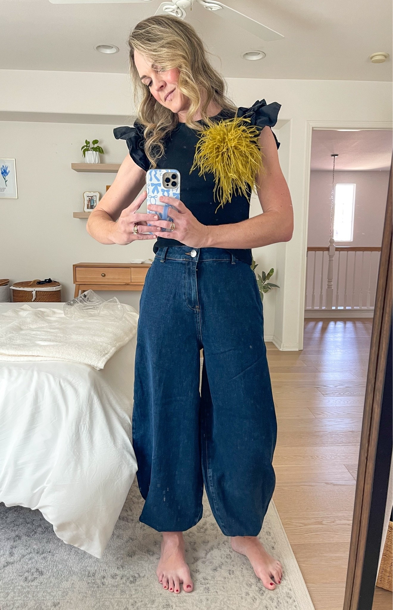Wanted to love these balloon jeans but they’re just a little too billowy through the legs for me BUT they are so comfortable and have a good weight to them and a little stretch. They fit TTS, wearing a 25.