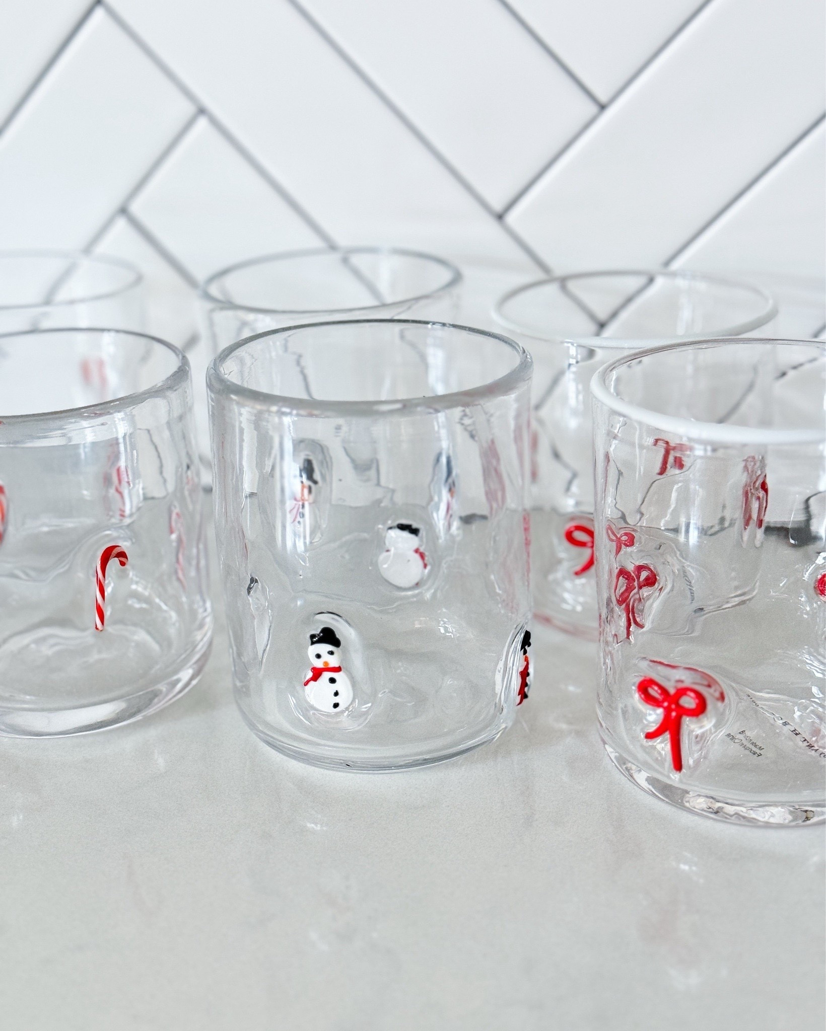 My holiday icon glasses are officially in the cabinet & they’re perfect because they make every drink & holiday mocktail, look like it belongs in a Christmas movie. If you’re hosting for the holidays, or just want something festive for every day, these are the glasses everyone comments on.

holiday glassware - Christmas drinkware - cold drink glasses - festive kitchen decor - holiday entertaining - Christmas party essentials - holiday bar cart ideas - cocoa bar setup - seasonal drinkware - cute holiday glasses - entertaining favorites - Christmas home decor - hostess gift ideas - winter entertaining essentials - kitchen decor favorites - festive home finds

#LTKHoliday #LTKGiftGuide #LTKSeasonal