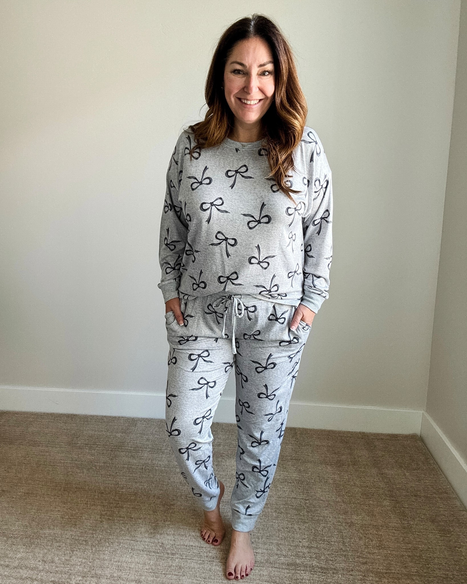 Holiday bow pjs 

#LTKMidsize #LTKHoliday