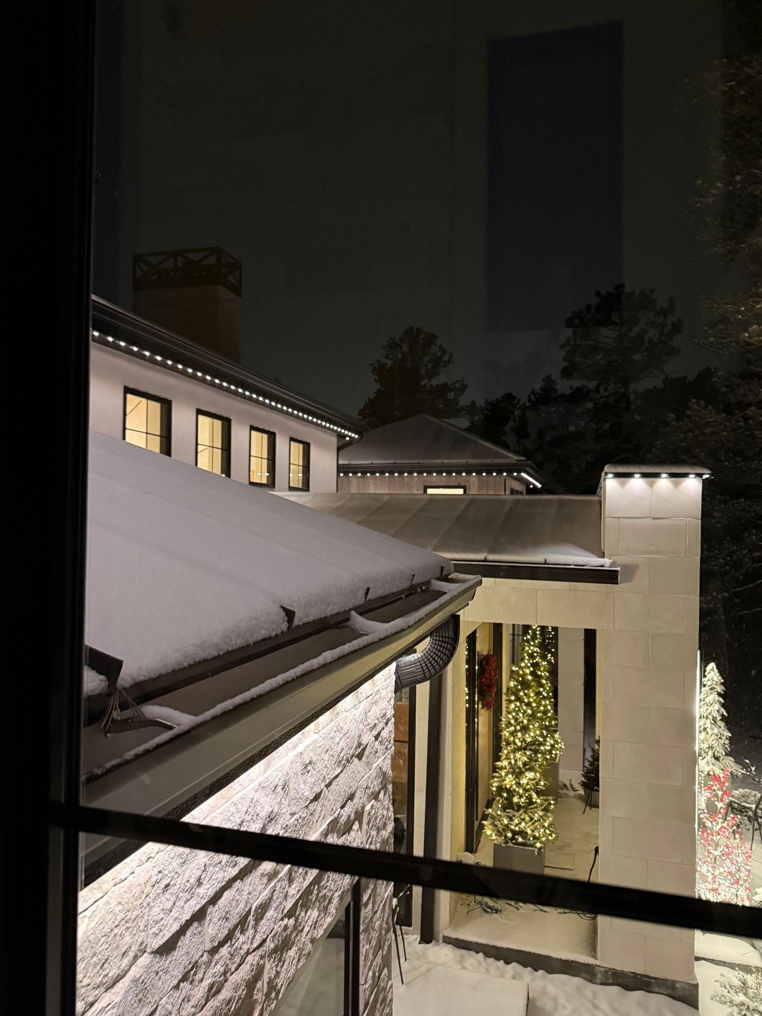 The front porch is still feeling magical from Christmas! I styled several skinny pine trees in planters for a full dimensional look.

#LTKSeasonal #LTKHome