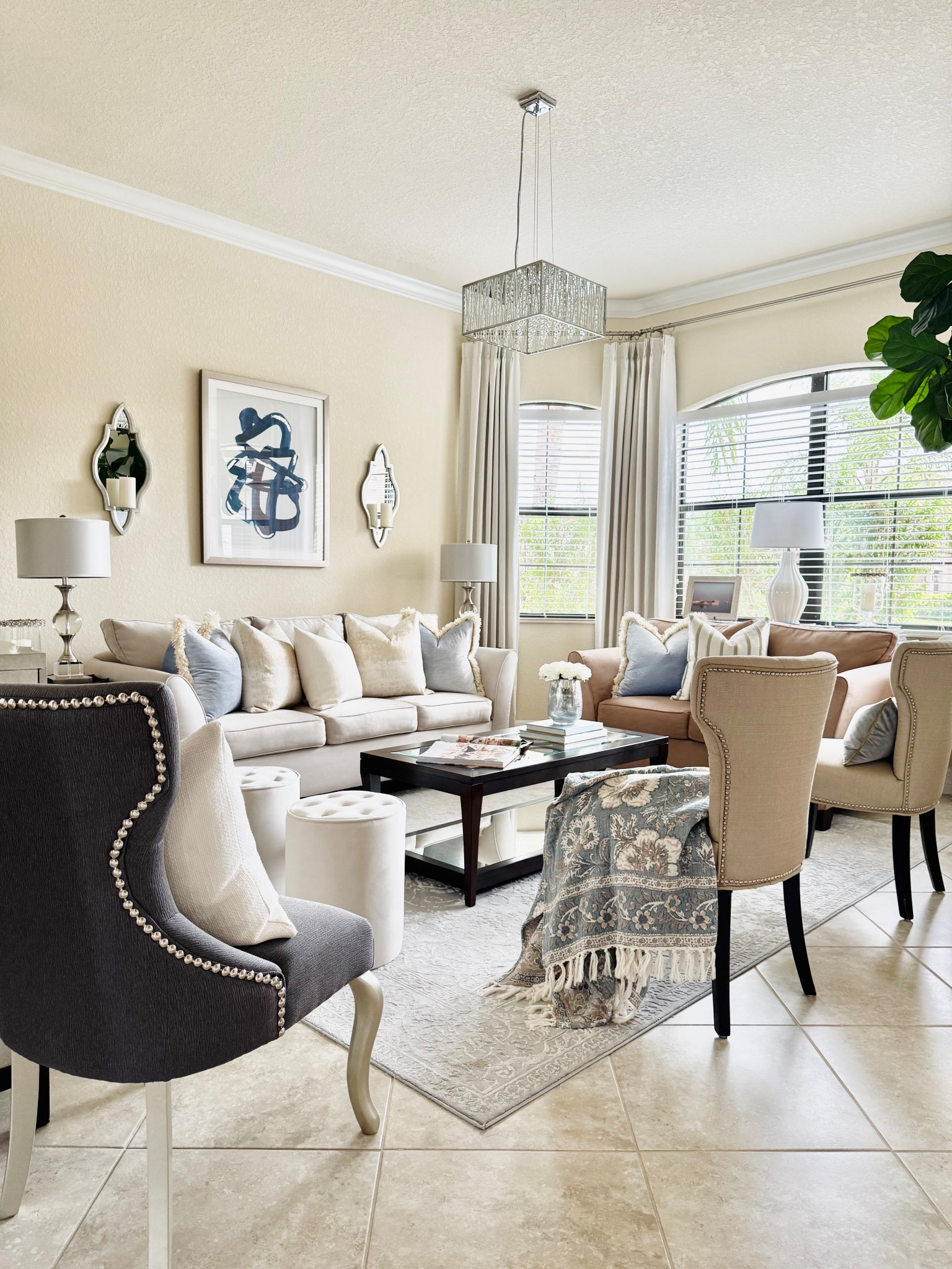 A beautiful blend of warm neutrals, classic blues, and rich wood tones in our formal living room! 🩵🤍🤎

Home Decor | Living Room Decor | Timeless Decor | Transitional Decor | Transitional Modern Coastal Decor | 2026 Home Decor Trends

#LTKHome