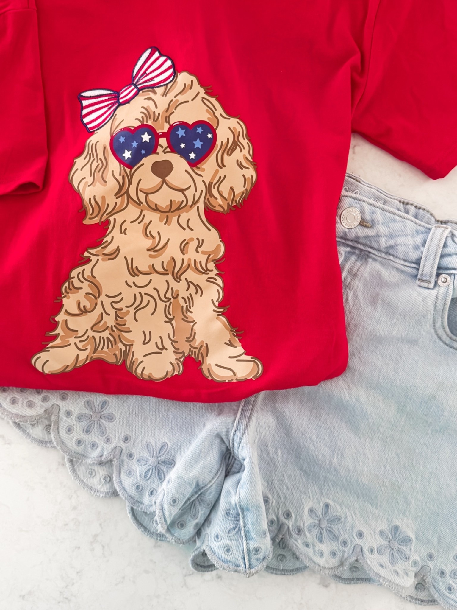 This adorable red white and blue doodle graphic tee + these embroidered scalloped denim shorts have been two of my favorite finds this week (and yours, too!). Such a fun outfit for the 4th of July and summer! The perfect summer outfit for girls xs-xl 😎🎀🐕

#LTKmomlife #LTKKids #LTKSeasonal