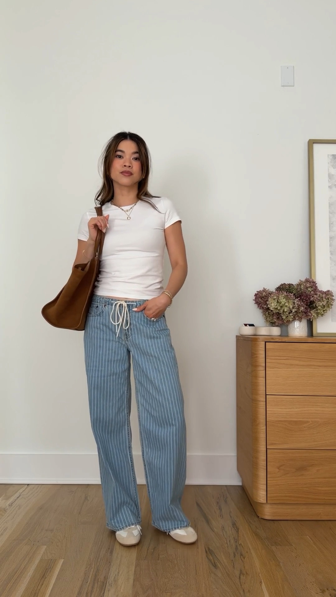 Sizing info:
•Tee size small
•Jeans size 24 short in medium stripe


petite fashion, get dressed with me, outfit inspiration, ootd, nashville outfit, Nashville influencer, petite style, vacation style, casual outfits, mom style, petite pants, spring outfits, spring outfit info, spring pants, spring outfit idea, spring top, spring bag, spring shoes, white tee, striped jeans, spring jeans 
@abercrombie 
 @Aritzia 

#LTKPetite #LTKmomlife #LTKootd