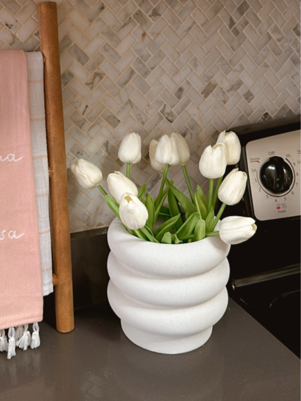 White planter from Walmart styled with white tulips from Amazon. 

#LTKSeasonal #LTKhome