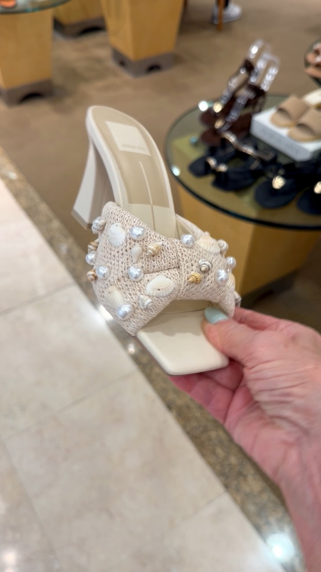 TYLAH is made for seaside dinner dates and destination weddings. This slip-on heel features a sturdy rectangular heel, modern angular toe, and chic beachy details. Wrapped in textured raffia, her bunched strap is embellished with delicate seashells and gold metal beads.

#LTKOver40 #LTKgrwm #LTKTravel