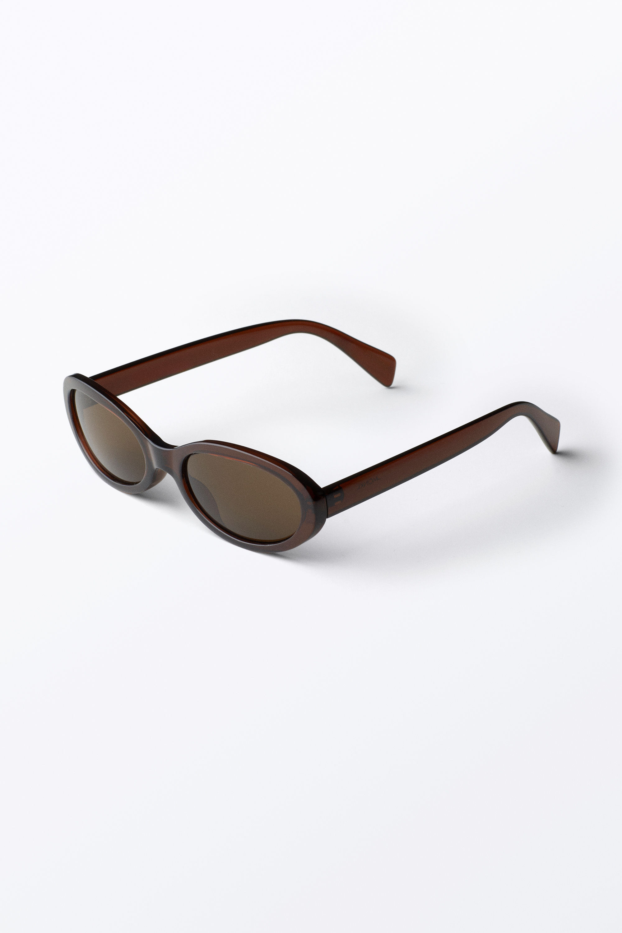 Slim Oval Tinted Sunglasses - Dark Brown - Brown Lenses - Monki GB | Monki