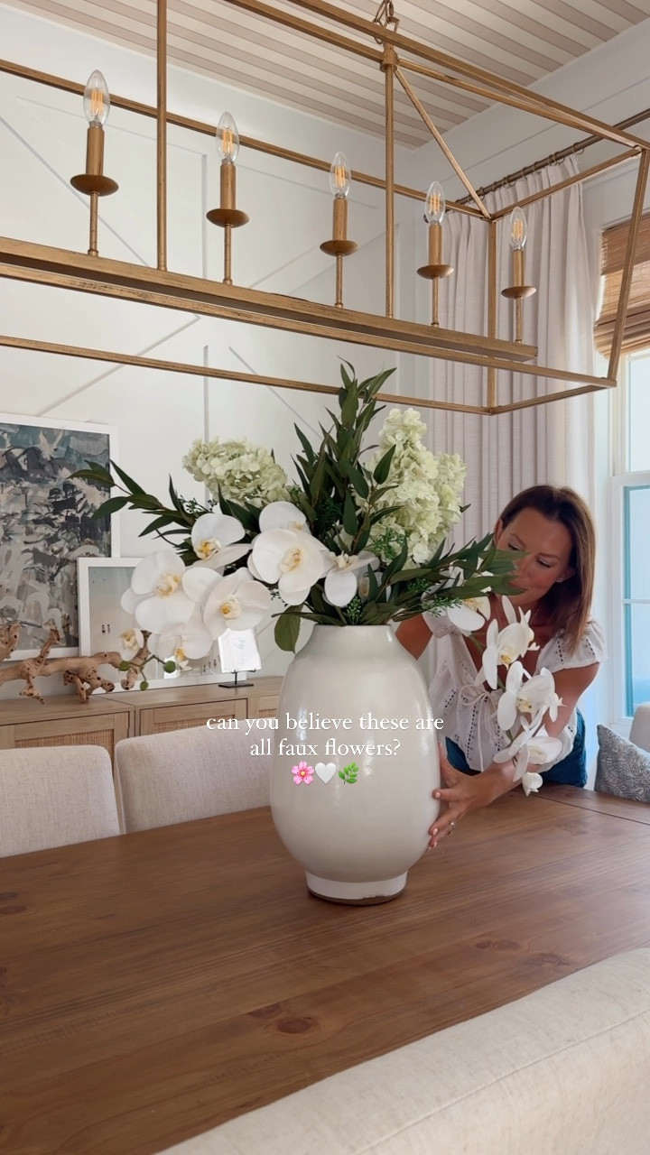 I love a good faux arrangement, especially one that looks this real 🤭 -I’ll link the eucalyptus + orchid stems, the hydrangeas came as a bundle of 3 from @homegoods 

save + share for inspo 🫶🏼
#fauxflorals #fauxflowers #flowerarrangement #diningroom #diningroomdecor #hydrangea #target #homegoodsfinds 

#LTKHome #LTKFindsUnder100 #LTKSaleAlert