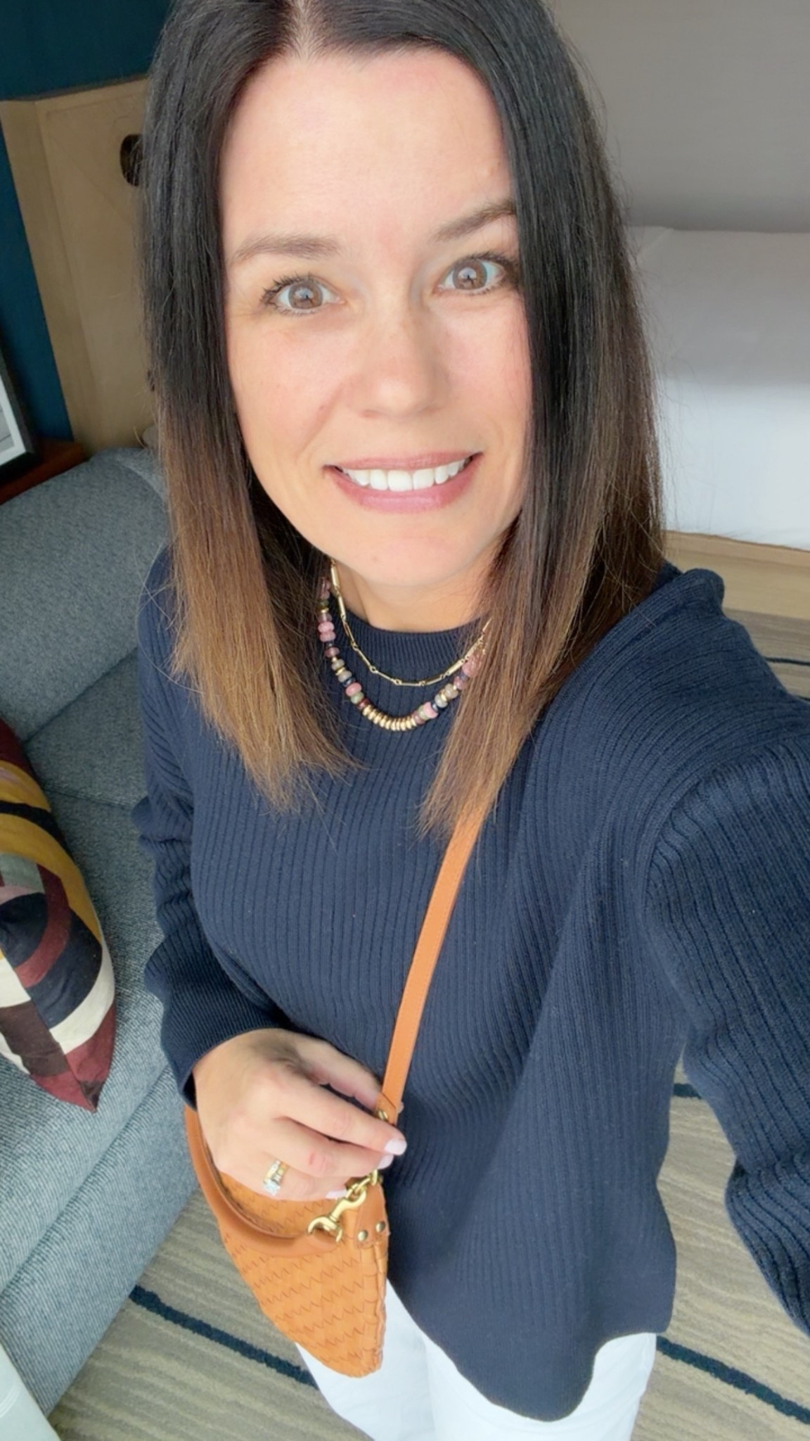 Super soft navy sweater and high quality purse. 

#LTKOver40