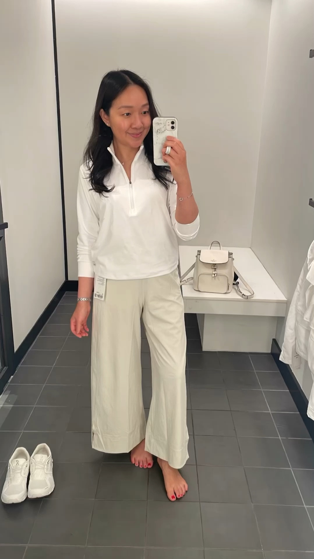 Lululemon Wide Leg Pants in size XS. 

Vuori white pullover in XL for a relaxed fit but I probably should have taken size L.

#LTKActive #LTKOver40