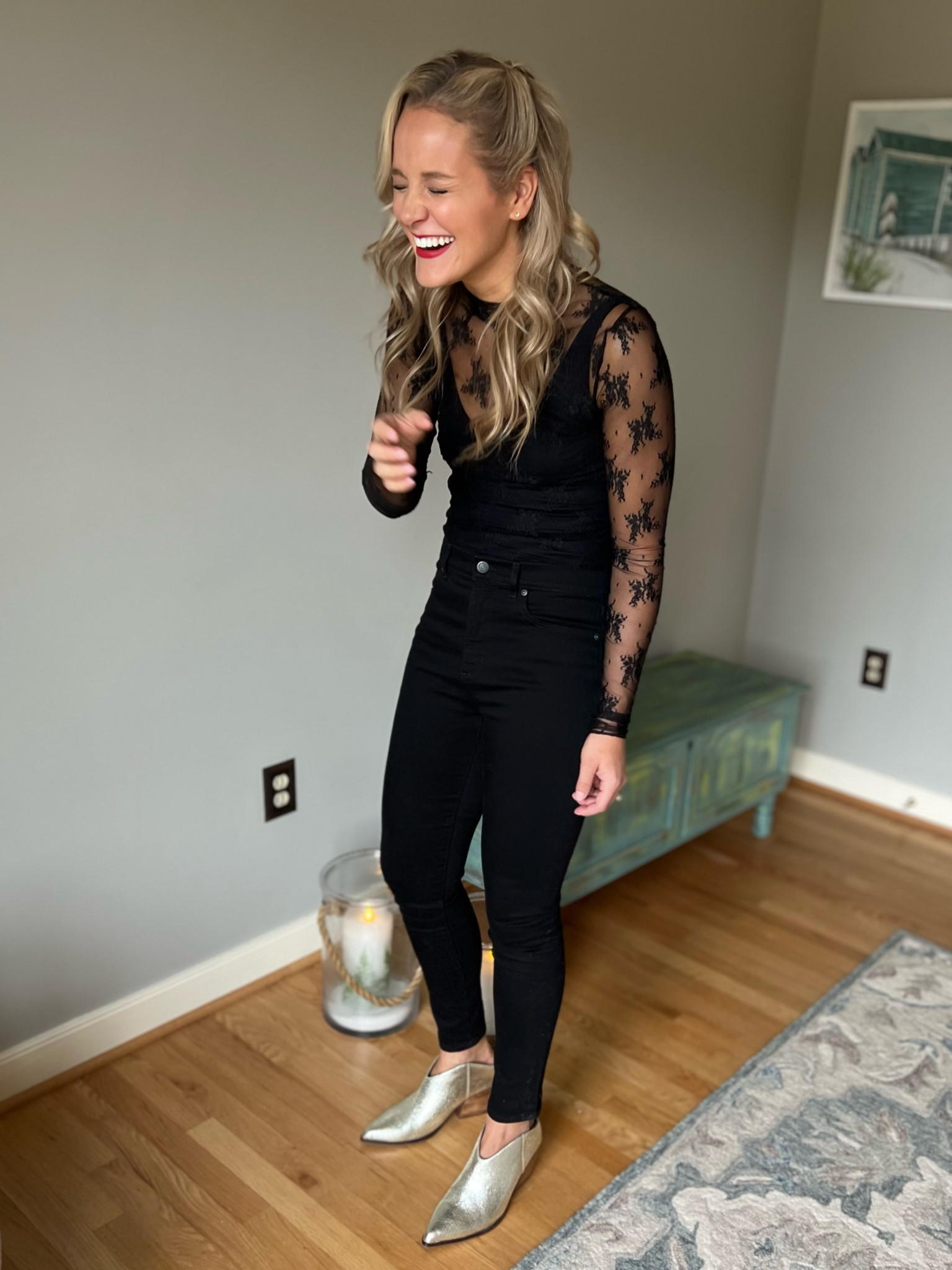 Size up one in the Free People Lady Lux Black Lace Long Sleeve Mock Neck Layering Top (wearing a medium) Pairs well over a black tank top, several options listed below! Go bold with red lips (wearing “hustle in heels”) and metallic booties from Revolve (fit tts)

#LTKU #LTKshoecrush #LTKunder100