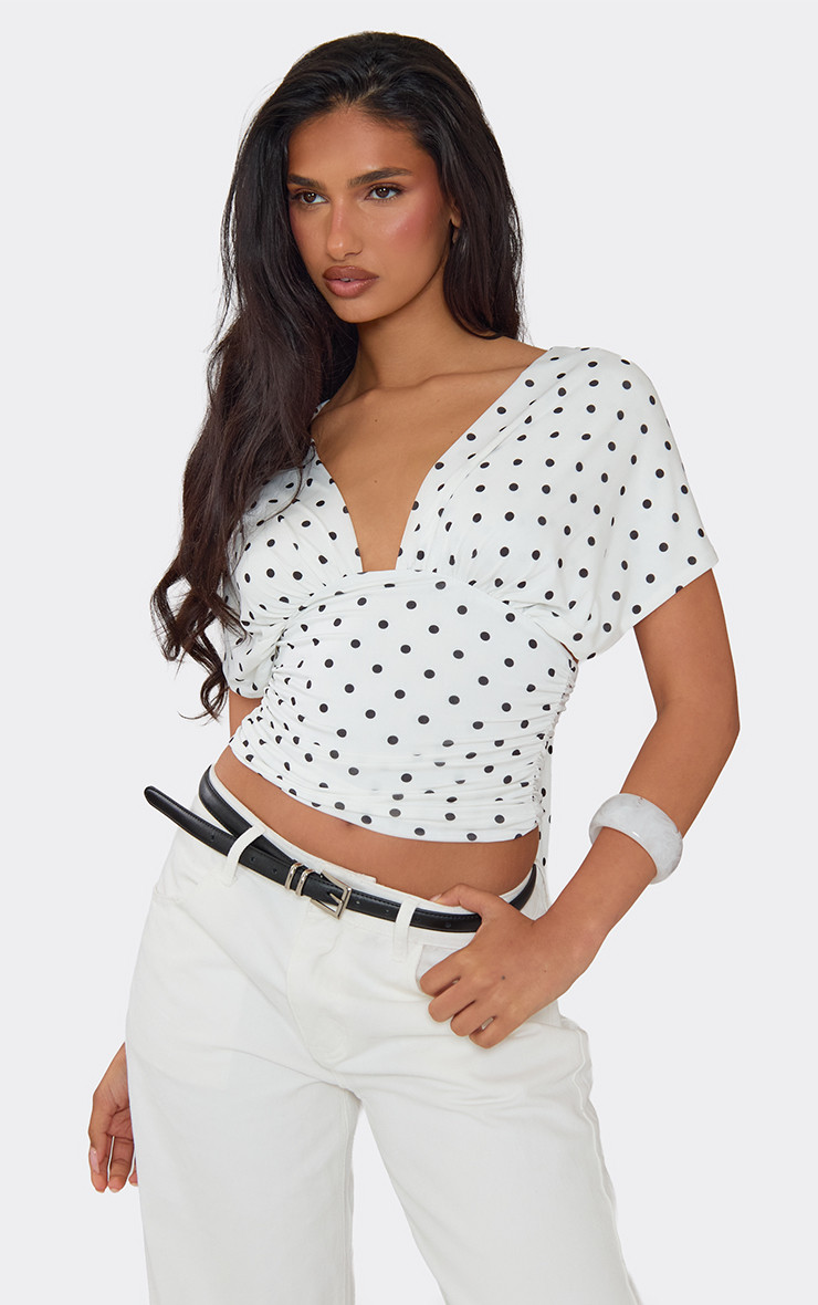 Short Sleeve Plunge Front Tie Back Detail Top In White Polka Dot Slinky | EGO (UK)