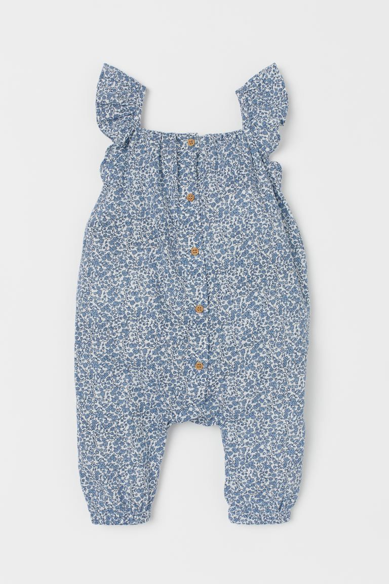 Sleeveless jumpsuit in airy, woven cotton fabric with a printed pattern. Ruffle-trimmed shoulder ... | H&M (US + CA)