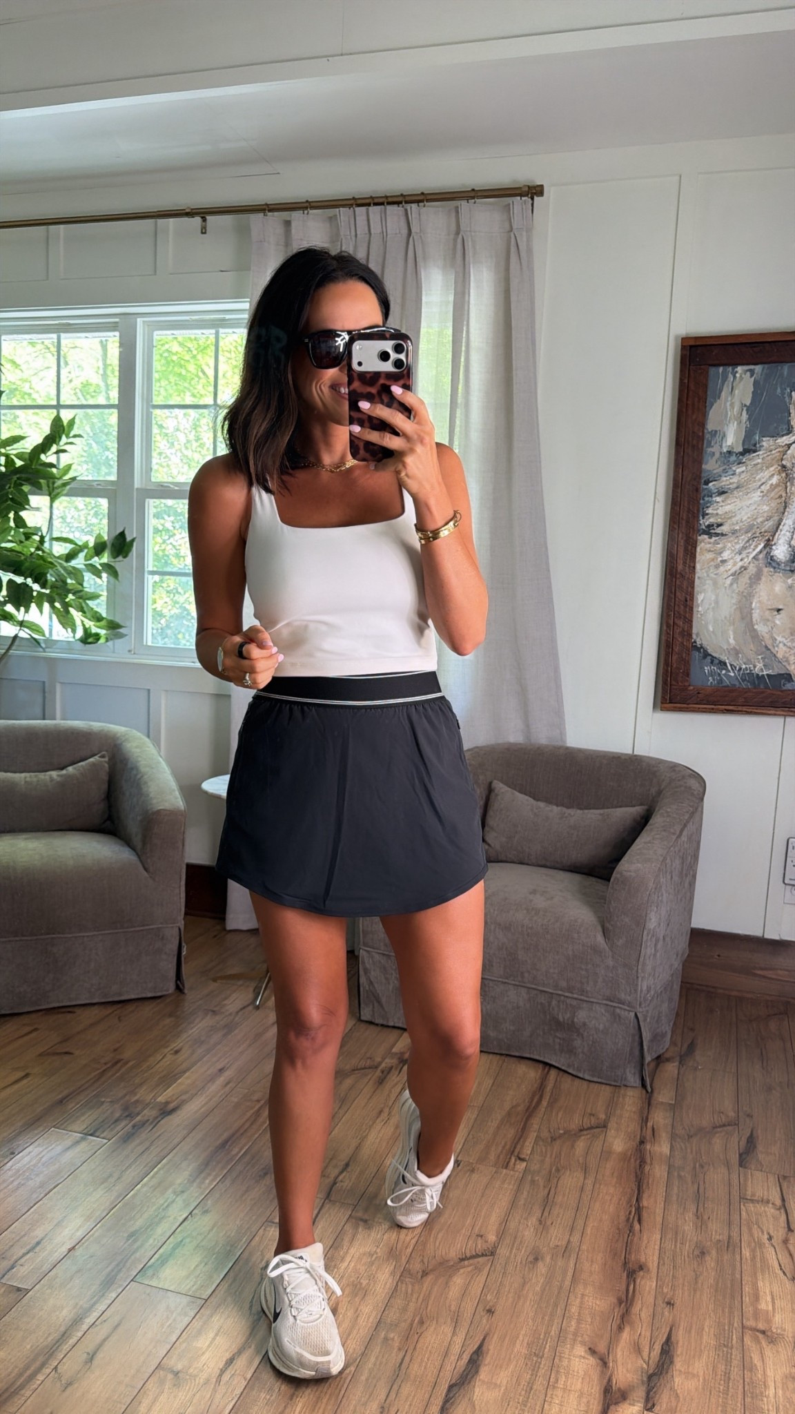 the PERFECT sporty chic outfit 🤍 and it’s from Walmart!!

this skirt is giving ALL the Alo vibes for way less
athletic skirt, tank top, and sneakers — so easy and cute

wearing size small (5’3” for reference!)

#walmartfinds #ltkstyle #athleisure #affordablefashion #sportychic #everydaystyle