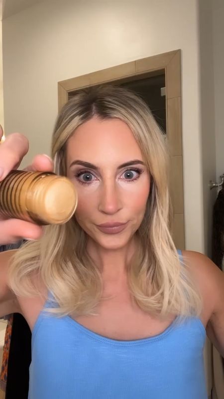 Em’s favorite gold highlight stick. You can use it as eyeshadow too! 

concealer foundation, makeup brush, and skin tint. 

My everyday makeup:
Concealer:  Cle de Peau - almond or beige
Foundation: fenty stick 8&9
Skin Tint: 2.5
Gold stick: good life gold
Lip liner: muted pink 
Gloss: dolled up 