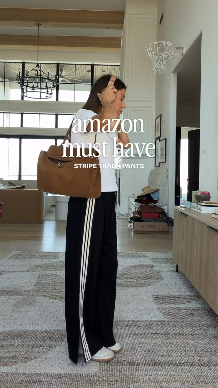 Amazon must have - black striped track pants 💫

#LTKgrwm #LTKOver40 #LTKootd
