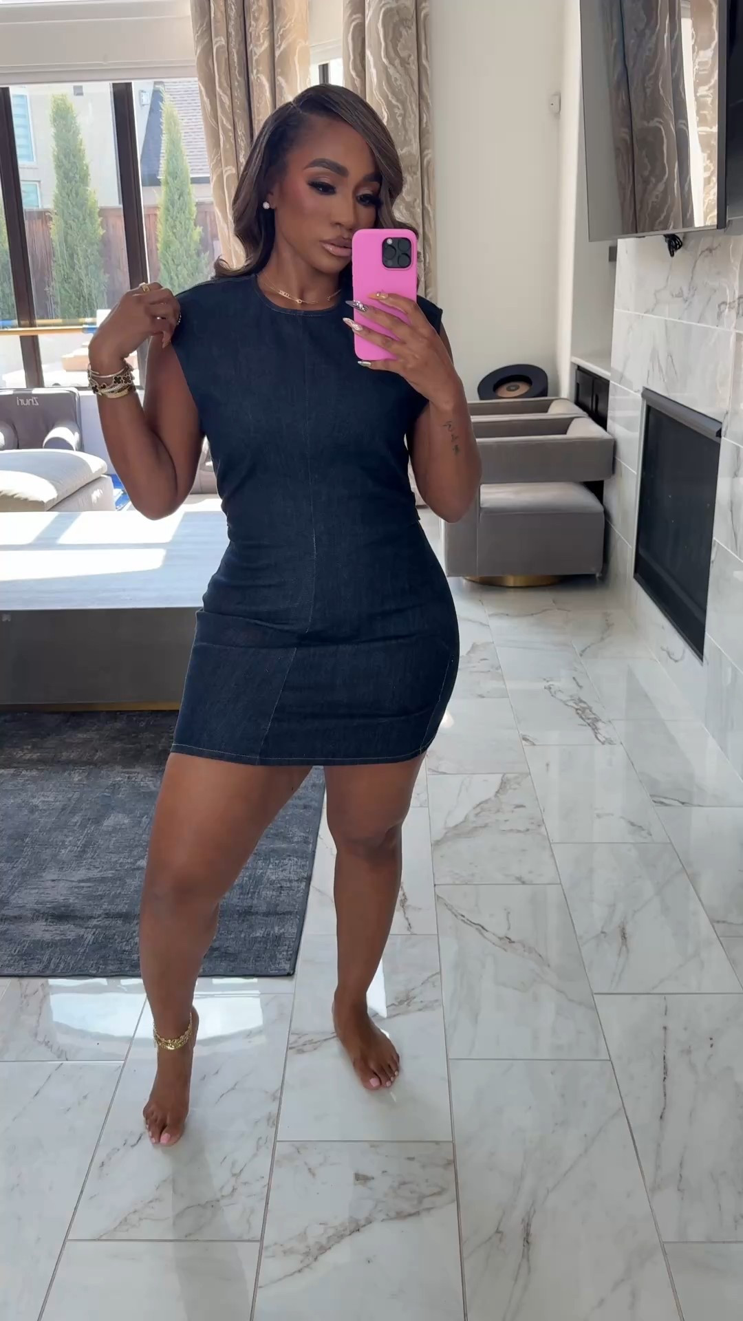 Denim mini dress find! Perfect to layer and pair with knee high boots! 

#LTKStyleTip #LTKFindsUnder100