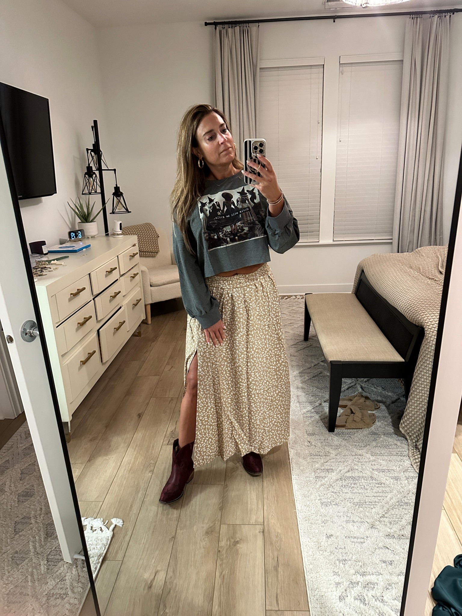 I’m digging this fun way to wear a ‘darker’ girl power type humor crop sweatshirt (which can be worn year round) but is extra fun around the month of October. The red ❤️ shorty cowgirl boots really make the outfit pop—feeling whimsical 😜

#LTKMidsize #LTKHalloween #LTKSeasonal