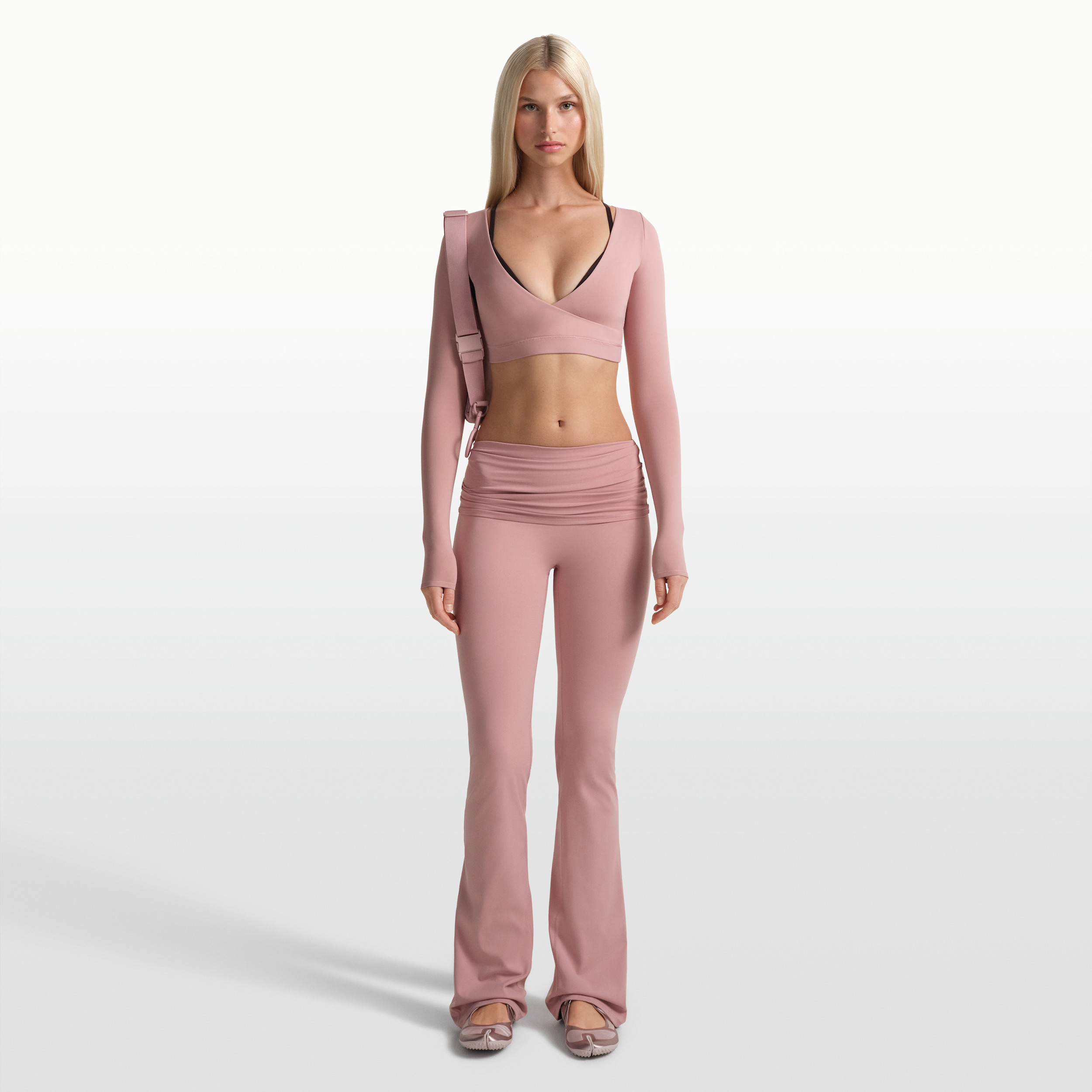 Nike Women's SKIMS Matte Flared Fold-Over Waistband Pants in Pink | BOLEG9493W-HIM | Nike (US)