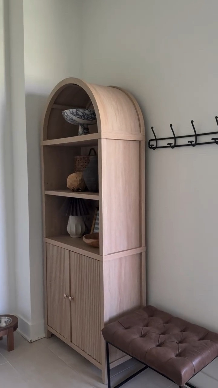 The arched cabinet of my dreams from @modernmate_official has made its permanent spot in our mudroom. Our goal eventually is to have built in lockers but for now this arched cabinet and bench work perfectly. 

Comment SHOP for a link and use code: Simply10 for 10% off
 https://www.modernmate.net/shop/simply40north_bookcase

#modernmate #archedcabinet #mudroomdesign