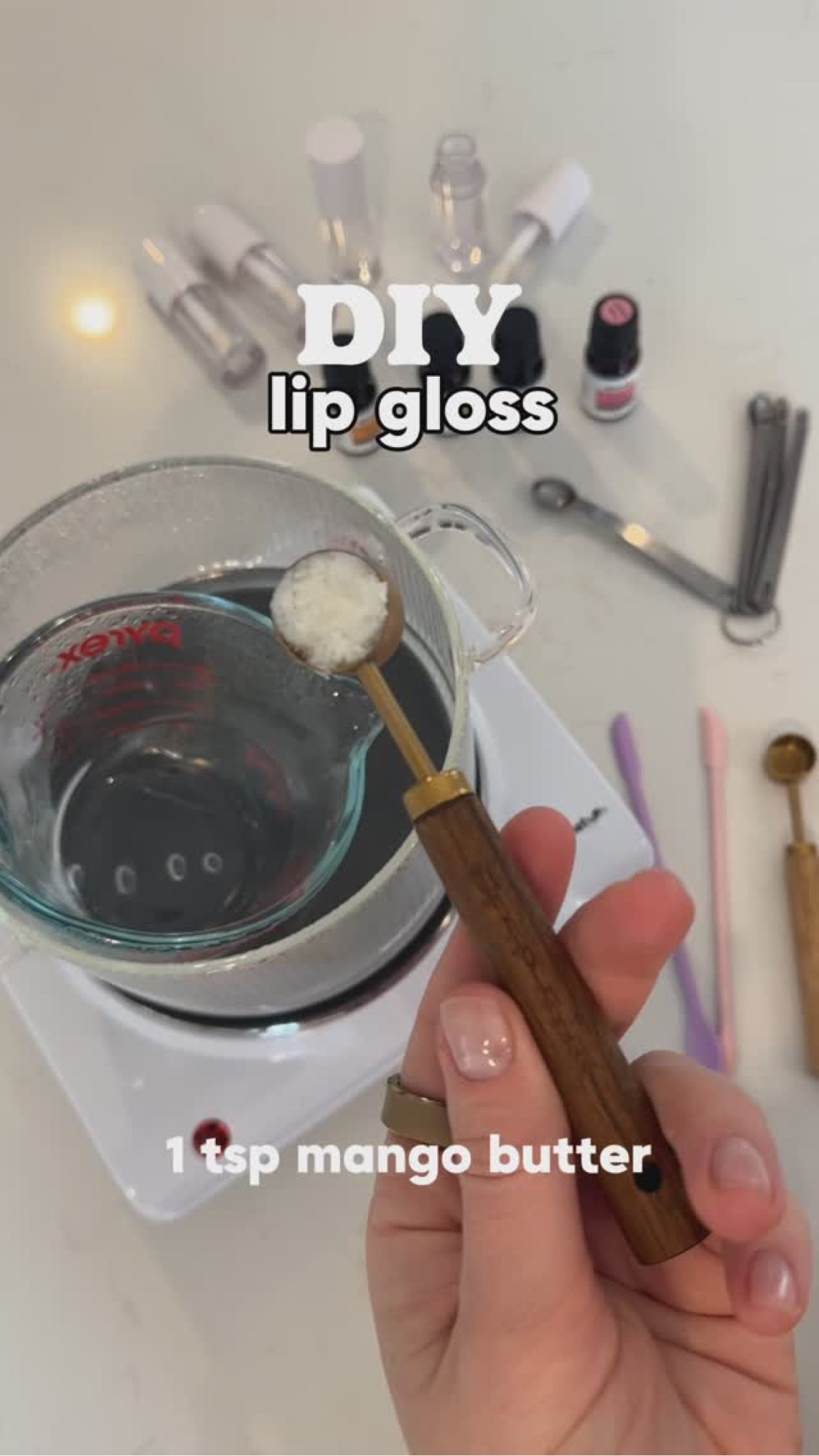 DIY Nourishing Lip Gloss with Essential Oils

This homemade lip gloss is ultra-hydrating, glossy (not sticky!), and customizable with essential oils and mica powder for a tinted shine.

Ingredients:
* 1 tsp Mango Butter (deeply moisturizing, softens lips)
* 1 tsp Jojoba Oil (lightweight, mimics skin’s natural oils)
* 1 tsp Sweet Almond Oil (soothing, rich in vitamin E)
* ½ tsp Castor Oil (for extra shine & a smooth finish)
* 10 drops Essential Oil Blend (see below for ideas)
* ⅛ tsp Mica Powder (optional, for color & shimmer)

Instructions:
1. In a double boiler (or microwave in short bursts), melt the mango butter until fully liquefied.
2. Stir in jojoba oil, sweet almond oil, and castor oil.
3. Remove from heat and add your essential oil blend, stirring well.
4. If using mica powder, sprinkle it in and mix thoroughly.
5. Pour into lip gloss tubes, roller bottles, or small jars.
6. Let it cool and solidify before use. Shake or stir if mica settles.

5 Essential Oil Blends for Different Aromas:
1. 🍊 Citrus Glow (Energizing & Uplifting)
 * 4 drops Sweet Orange
 * 3 drops Grapefruit
 * 3 drops Lemon
2. 🍯 Vanilla Spice (Warm & Cozy)
 * 4 drops Vanilla oleoresin
 * 3 drops Cinnamon Bark
 * 3 drops Sweet Orange
3. 💐 Floral Kiss (Soft & Romantic)
 * 5 drops Lavender
 * 3 drops Geranium
 * 2 drops Ylang Ylang
4. 🍬 Minty Fresh (Cooling & Refreshing)
 * 5 drops Peppermint
 * 3 drops Spearmint
 * 2 drops Vanilla oleoresin
5. 🍫 Chocolate Bliss (Sweet & Decadent)
 * 5 drops Cocoa absolute
 * 3 drops Vanilla oleoresin
 * 2 drops Sweet Orange

Tips:
* Store in a cool, dry place.
* Adjust mica powder for a sheer or bolder tint.
* Add a pinch of beeswax for a firmer, balm-like texture.