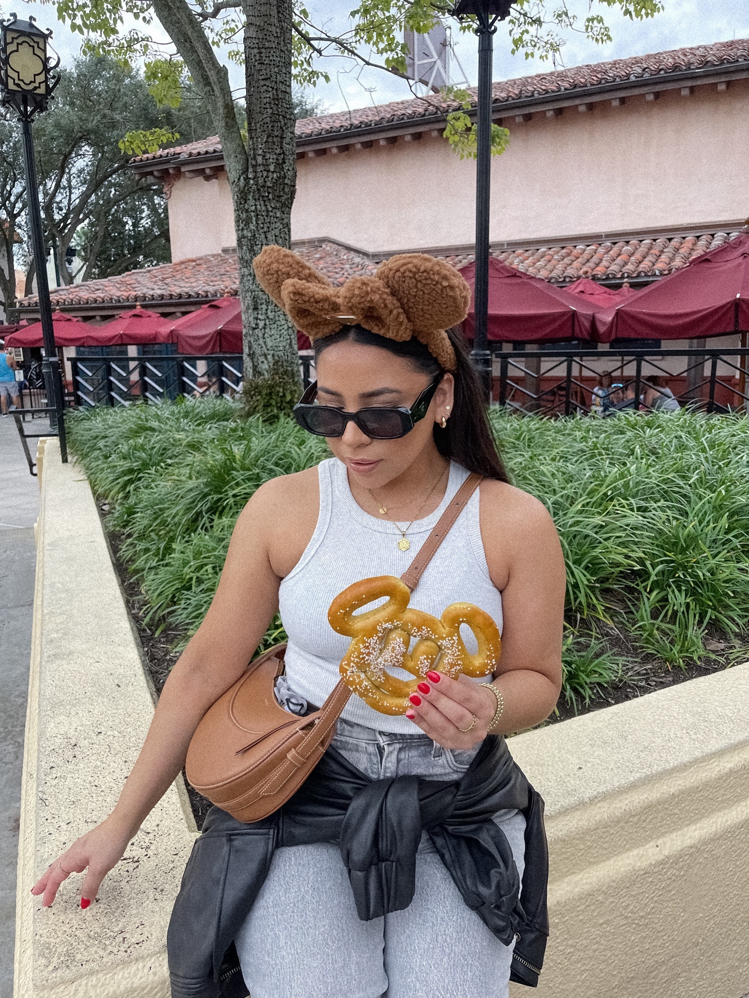 Disney Hollywood studios outfit idea 
cropped tank: small
Leather bomber jacket: xs 
Abercrombie 90s jeans: 27 short 
New balance 9060 sneakers: 4.5 men 
Prada sunglasses 

#LTKstyletip #LTKsalealert #LTKSeasonal