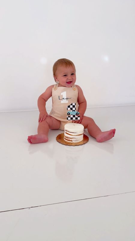 Leo is turning one! I love this smash cake outfit that I got for him off of Etsy. He is wearing a size 24 months. I do feel a seize 18 months would have been better..it was falling off of his arms. If in between sizes., I would size down. Leo is about 25 pounds.

First birthday baby outfit
First birthday car theme
Fast one theme
Smash cake 
Baby first birthday
 Boy First Birthday Outfit. 1st Birthday Romper. Cake Smash Outfit Boy Linen Romper Tan Khaki Blue Green. Personalized Name
Personalized baby outfit 
Hand Embroidered Crown for Baby and Children's Birthdays | Personalized Keepsake for First Birthday and Special Occasions


#LTKbaby