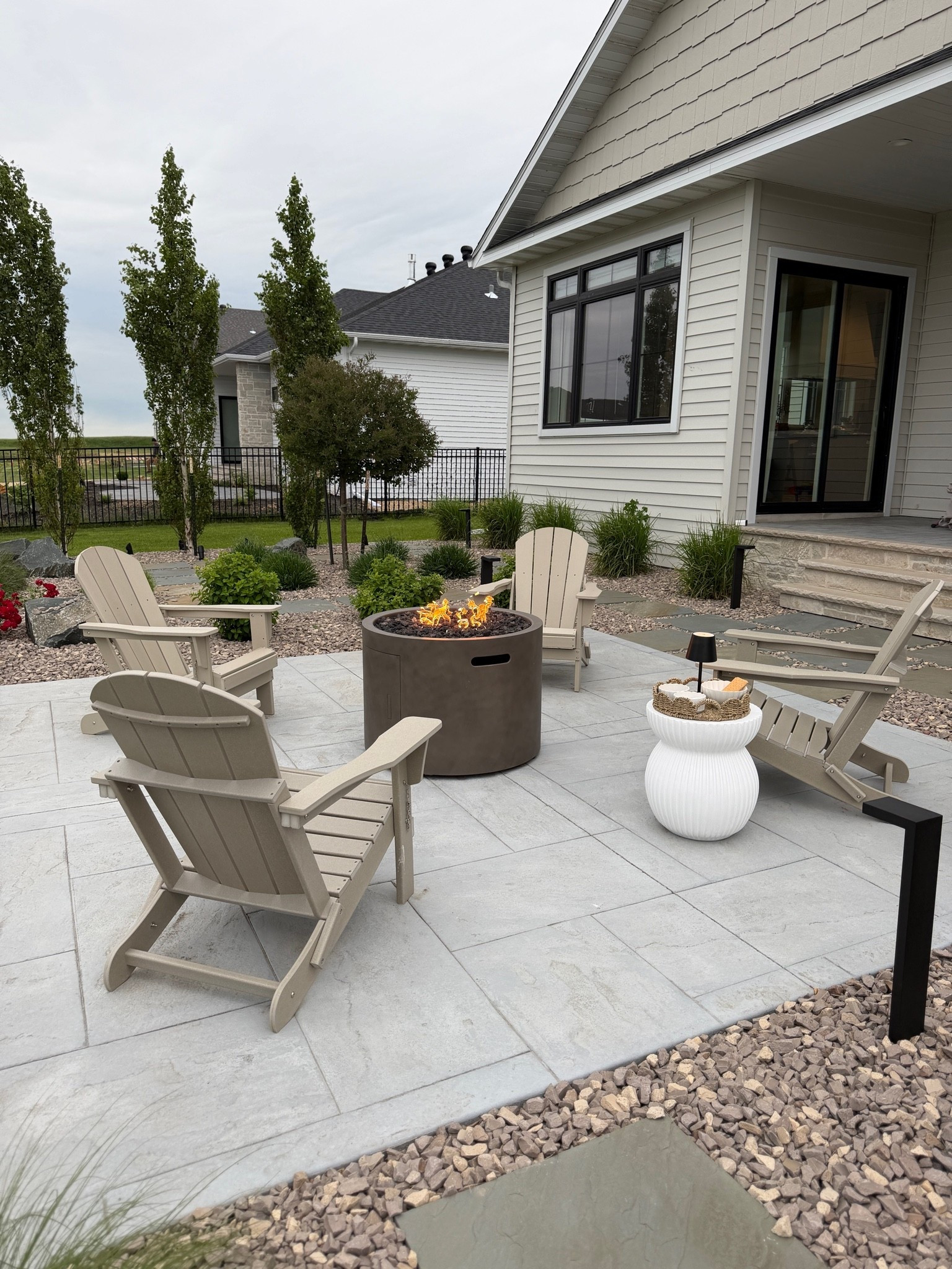 ￼ Lots of questions on our fire pit, we got this from Costco a few years ago, but I found a few similar options. I added black lava rock that I purchased from Amazon. It really helped elevate the fire pit because it came with blue glass beads 🫣￼

#LTKHome #LTKSaleAlert