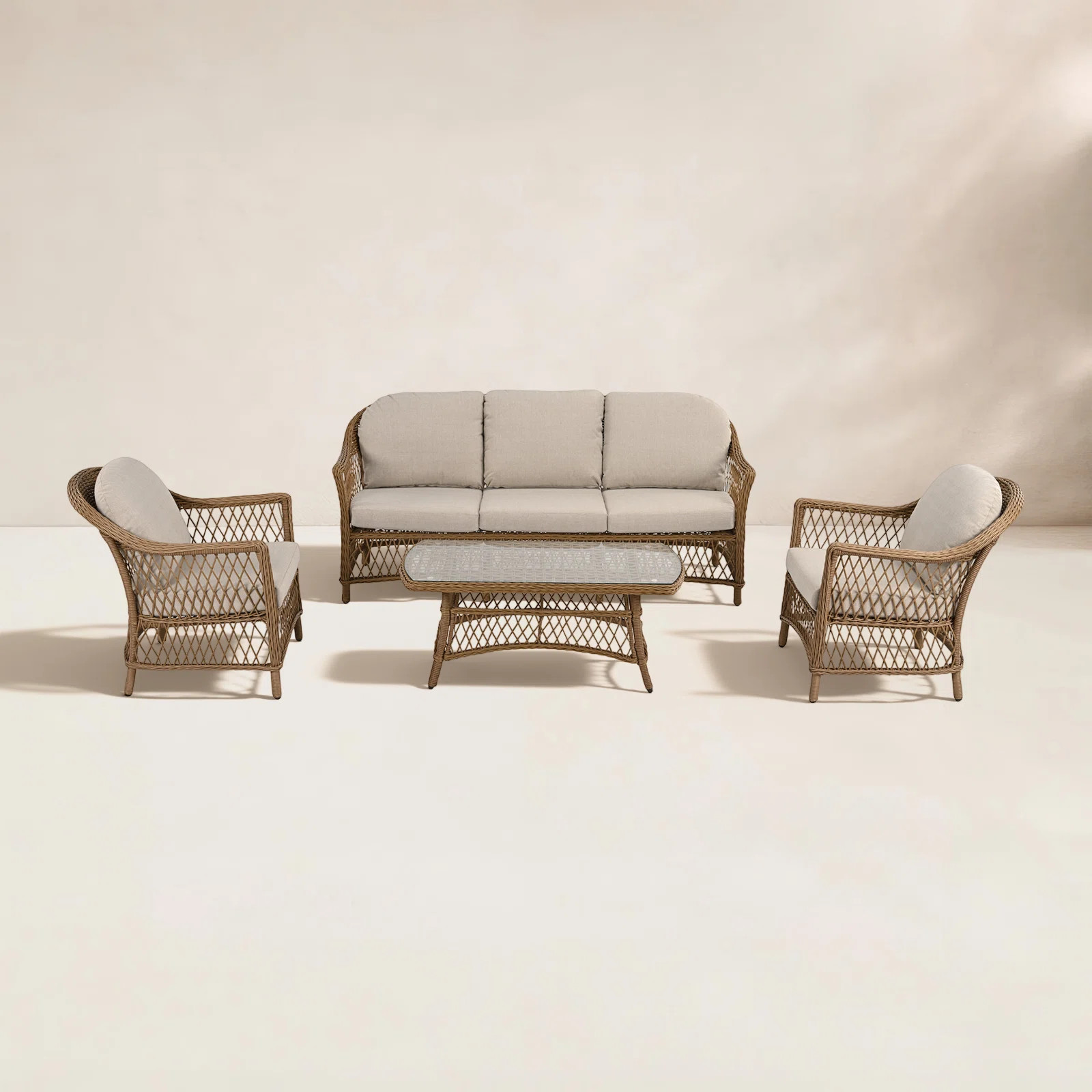Kyla 4-Piece Wicker Patio Conversation Set With Coffee Table And Beige Cushions | Birch Lane