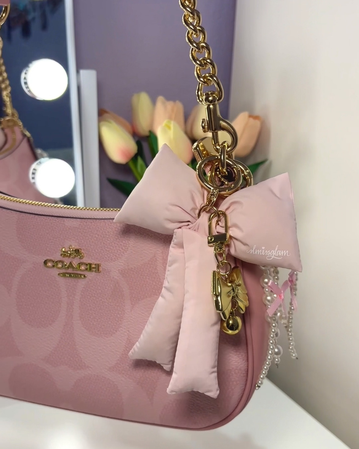 Cutest bag charms 🎀🌸 #coachbag #pinkcoachbag #bagcharm #keychain 