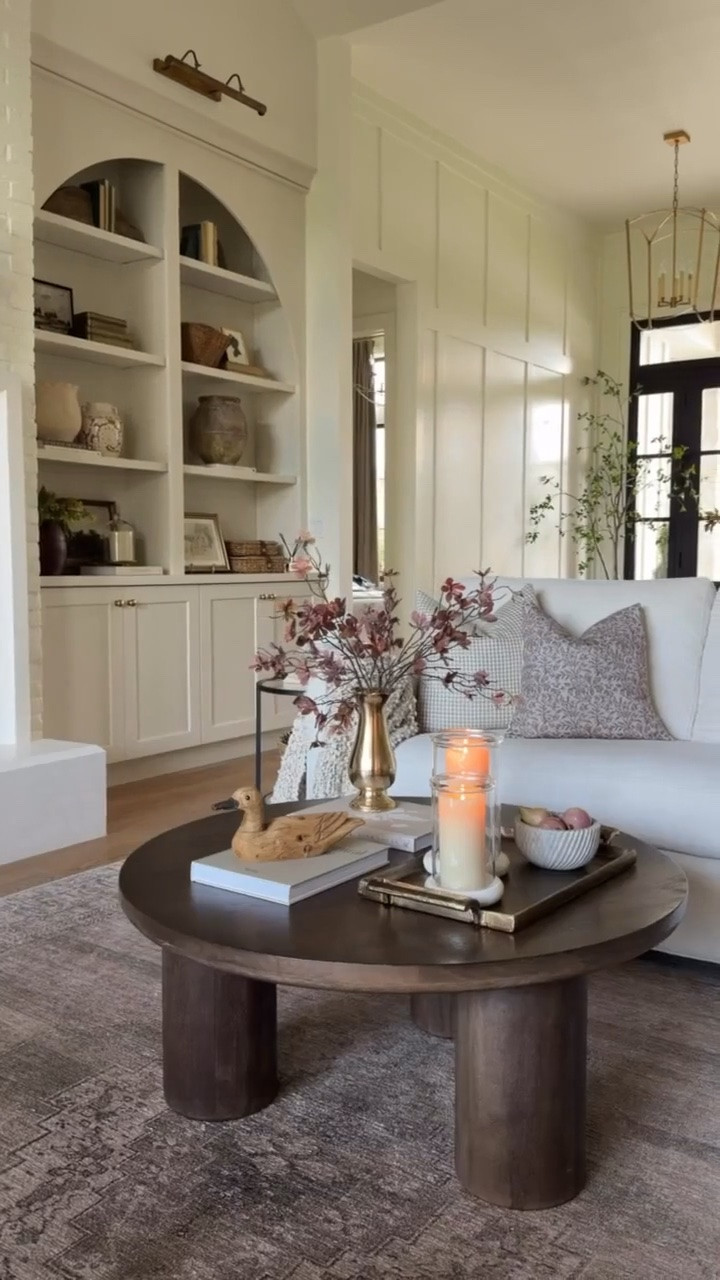 Early fall transitional coffee table styling! My coffee table is 26% off right now and under $1,000!! A beautiful mix of modern and traditional with the dark finish and pillar legs.

#LTKHome #LTKSaleAlert