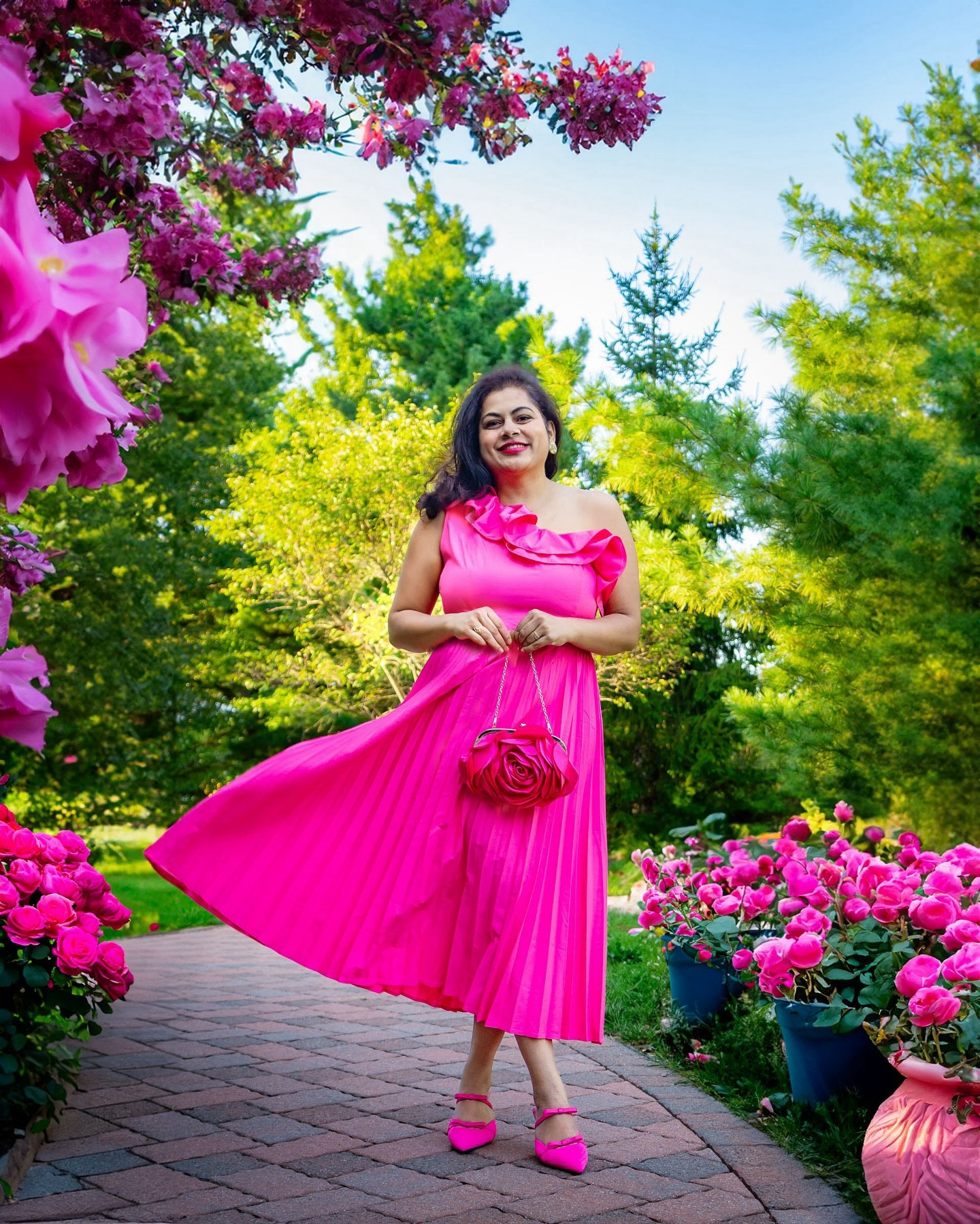 Dripping in pink from head to toe, making every shade a statement! 💞

👠Heels : “Bowtention Pointed Toe Heeled Mules” from @cosyisland_official in the color Pink .These shoes retails at $89.Use the code “HERWIN20” for a 20% off on ur order

👗Dress: One shoulder floral pink dress from @roseweofficial 

👛 Bag: In love  with this beautiful flower shaped bag from @amazonfashion 

#cosyisland #cosyislanders #njinfluencer #ugccreator #influencer #styleblogger #styleinspo #mules #shoes #shoesaddict #amazonfinds #amazonfashion #amazondeals #rosewe #roseweofficial