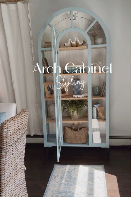 perfect coastal touches to kick off Spring from @a2interiorhomedecor 🐚🌊🌾 



Rattan Picture Frames, Blue and White Ginger Jar, Light Blue Wool Runner, Arch Cabinet, Shelf Styling, Coastal Decor  #ad #gifted 

#LTKSeasonal #LTKstyletip #LTKhome