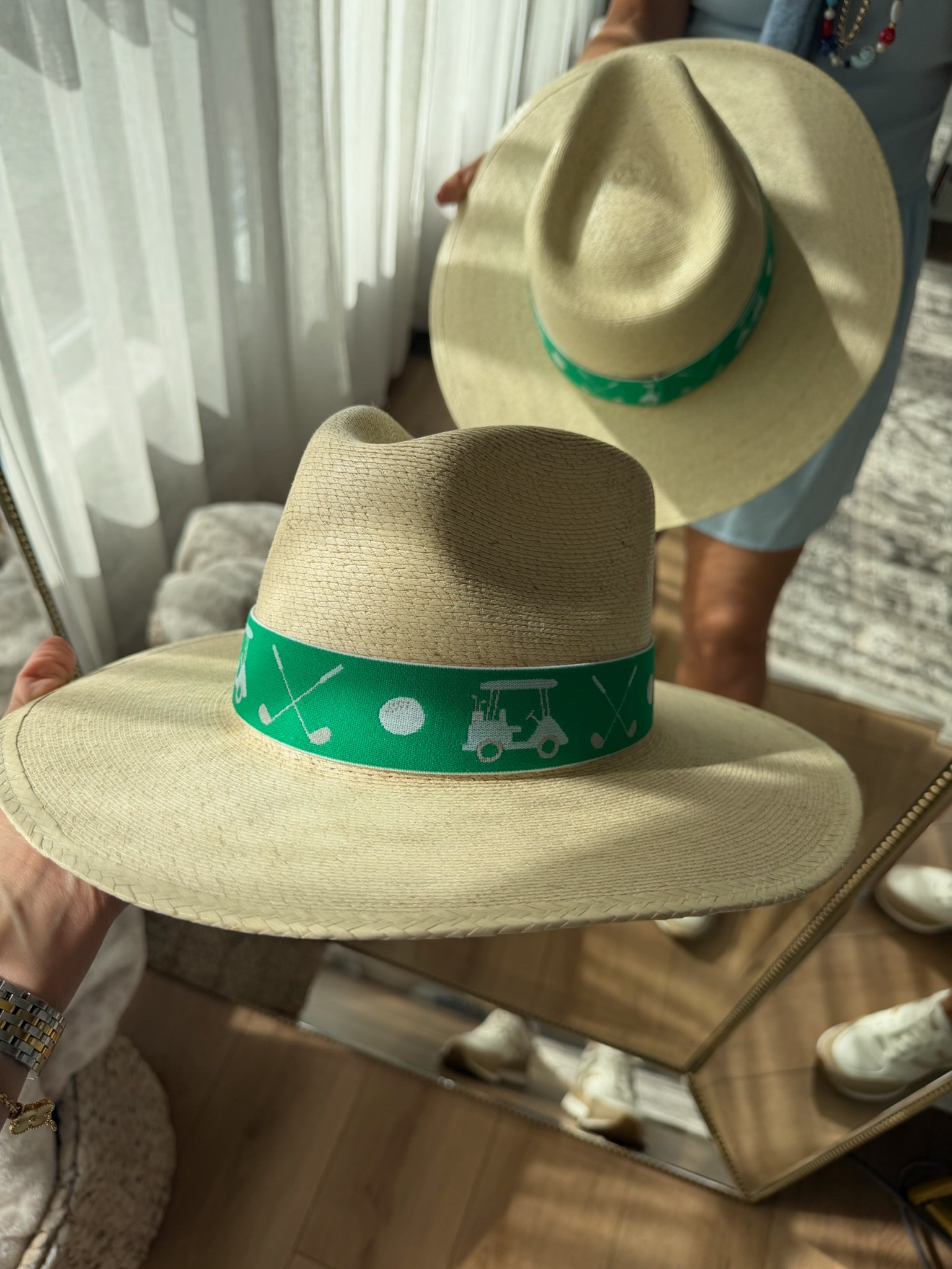 The golf moms are going to want this one. The cutest wide brim hat with a golf inspired band that instantly makes any tournament or clubhouse outfit look pulled together. Such a fun accessory for summer golf days.

golf hat, golf accessories, golf outfit, golf mom style, country club fashion, cart girl outfit, golf tournament outfit, summer accessories, wide brim hat, vacation style, resort wear, TheMomInStyle

#LTKootd #LTKmomlife #LTKSeasonal