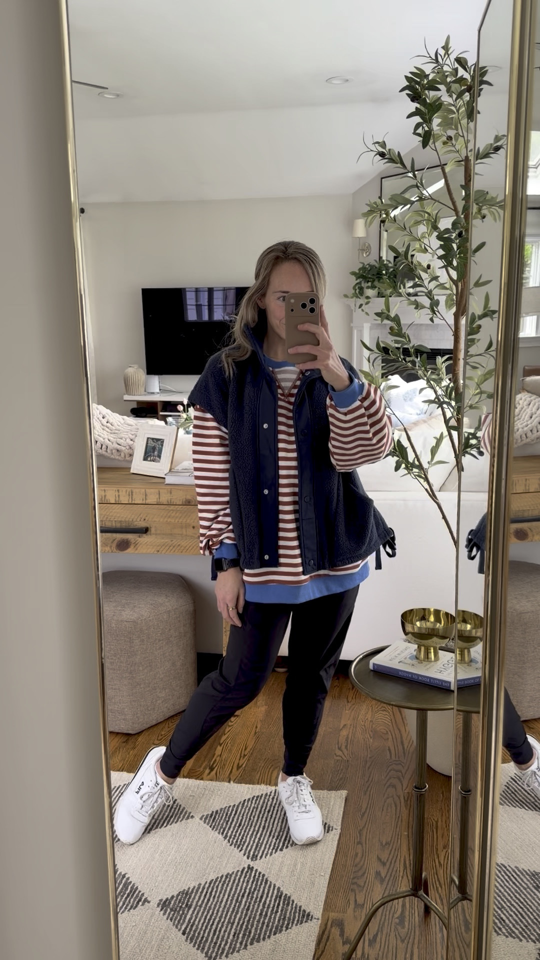 The weather in NJ has been so annoying going from hot 80 degree days to cold 30s! 

The only way to manage unpredictable weather is dressing in layers- which is why I literally LIVE in this cozy oversized fleece vest! 

I throw this FP look-a-like oversized vest on over everything- all year round- I even wear it in the house! It’s warm, cozy, and big enough to fit over bulky sweatshirts, making it a great layering piece!

Another FP inspired piece (& a closet staple!) is this lightweight (yet thick quality material), terrycloth-lined, crewneck LS shirt from Amazon.

I wear these black Athleta joggers everywhere from running errands, to the gym, & especially to the airport! They’re lightweight, stretchy, & so comfortable — yet the material doesn’t wrinkle, so you always look put together! 

Throw on a simple pair of sneakers and you’re ready to run errands or enjoy a casual day out! 


SIZING 📏
• Sneakers: TTS
• Joggers: TTS (i’m wearing size XS)
• striped LS shirt: oversized (I’m wearing my true size, S)
• Sherpa Vest: oversized (I’m in between an XS & S so I went with size Small bc I’d rather it be slightly big than too small.


.
.
.
travel outfits 
easy daily outfit idea for women 
comfy airport outfit
2026 casual spring outfit women
spring fashion 2026
mother’s day gift ideas
spring wardrobe staples
summer lightweight layers 
summer outfit 
designer-inspired women’s fashion
@amazonfindsandfashion

#LTKActive #LTKTravel #LTKootd