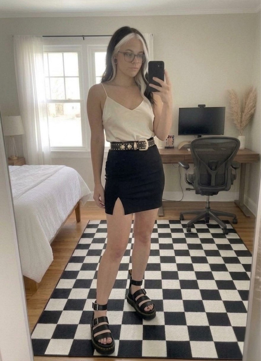Switching up the warm-weather wardrobe with an edgy, corporate-goth-meets-90s-grunge aesthetic. This look perfectly balances casual comfort with a sharp, alternative edge. I paired a luxurious cream Wantschun silk satin camisole with a high-waisted, stretchy side-slit mini skirt by Mefija to create a sleek silhouette.

To bring in that classic alternative vibe, I structured the outfit with a bold, gold-studded black leather belt by JASGOOD and anchored it all with my go-to Dr. Martens Blaire platform sandals. It’s the ultimate effortless but put-together uniform for city strolls, casual business-casual days, or content filming.

#LTKootd #LTKSeasonal #LTKSaleAlert