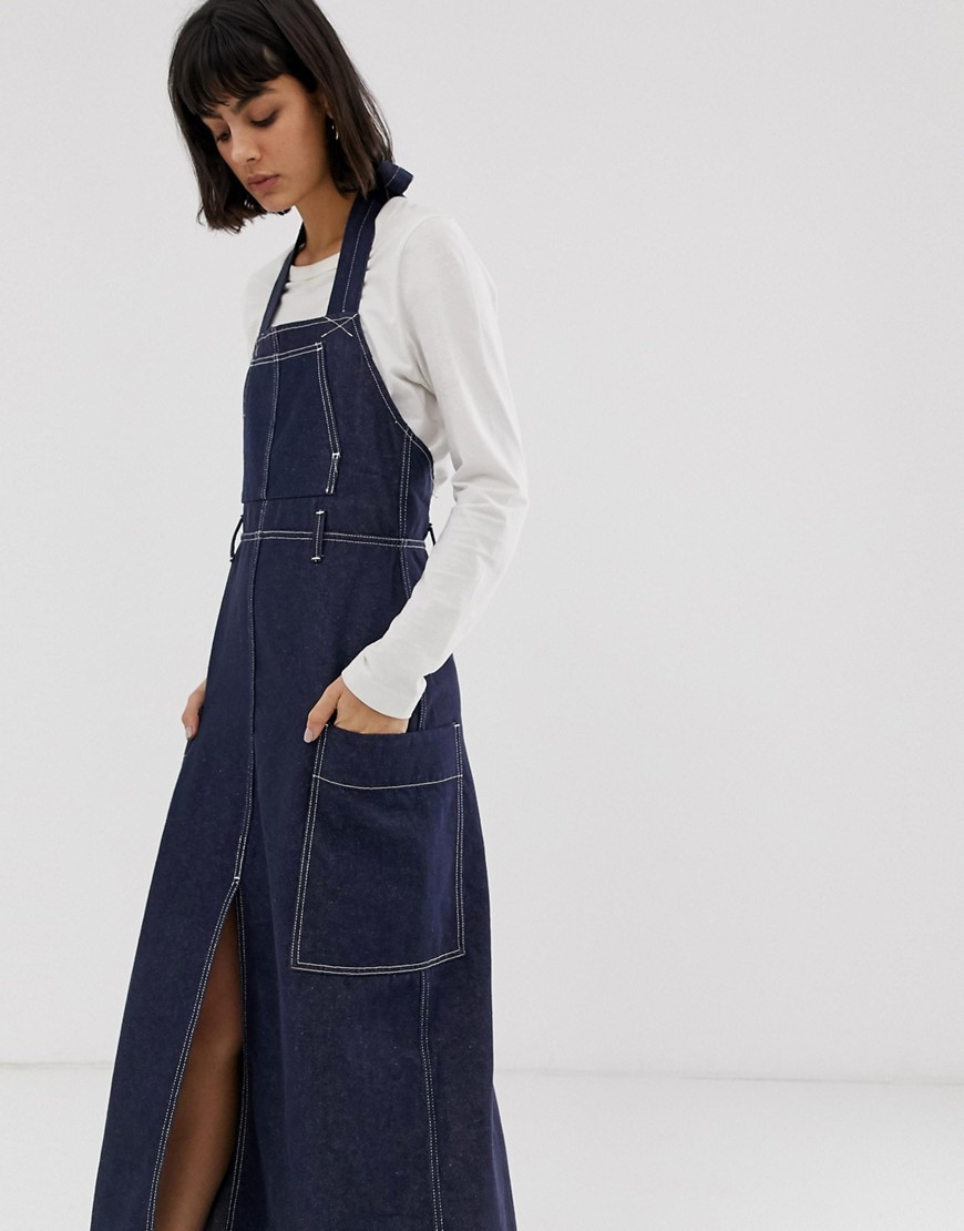 Weekday recycled edition apron denim dress in blue | ASOS (Global)