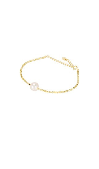 SHASHI Dasha Bracelet in Metallic Gold. | Revolve Clothing (Global)