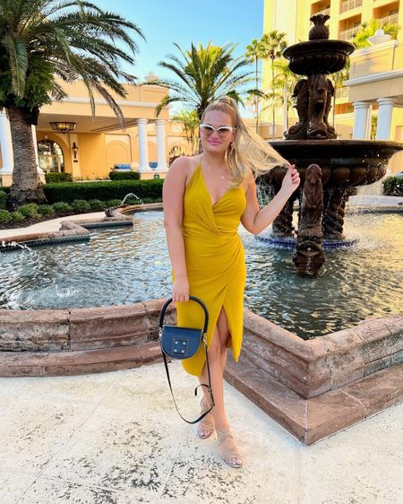 Fall in Florida 🍁 wearing Cushnie from Rent The Runway! This is a wrap dress with an asymmetrical neckline and silt.  Paired this with nude heels from Sam Edelman and a fun bag from Salar.  

#LTKtravel