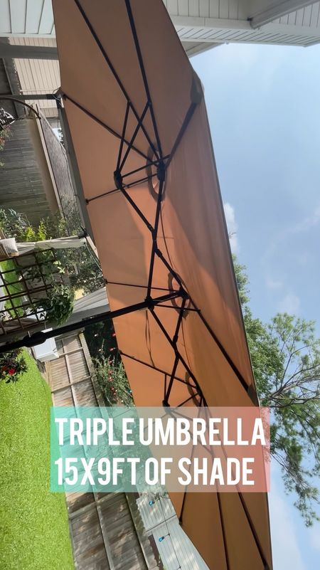 Keep everyone comfortable at your outdoor parties with this oversized market umbrella! 

This umbrella is a triple sized umbrella that opens up wide and is single-handed operation! This large large patio umbrella provides just as much shade as my 10 x 12 pergola does over our backyard but it required no installation besides setting up the base (yes the weighted base is included!). 

We got this 2 summers ago and I have never been happier to  report that it is still in great condition. We keep it uncovered, most of the summer season, but I do cover it for extreme weather with a waterproof cover.  

We use it when hanging out in the backyard and it keeps our patio space comfortable when we are having outdoor parties during summertime   

#LTKSeasonal #LTKHome #LTKParties