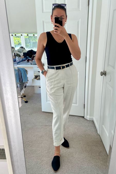 One of my favorite target finds are these loose fit pants. So comfy, not too baggy and not super see through. 

I paired it with a black v cut neckline tank top, black belt , black mules and gold accessories. 

#LTKStyleTip #LTKOver40 #LTKBeauty
