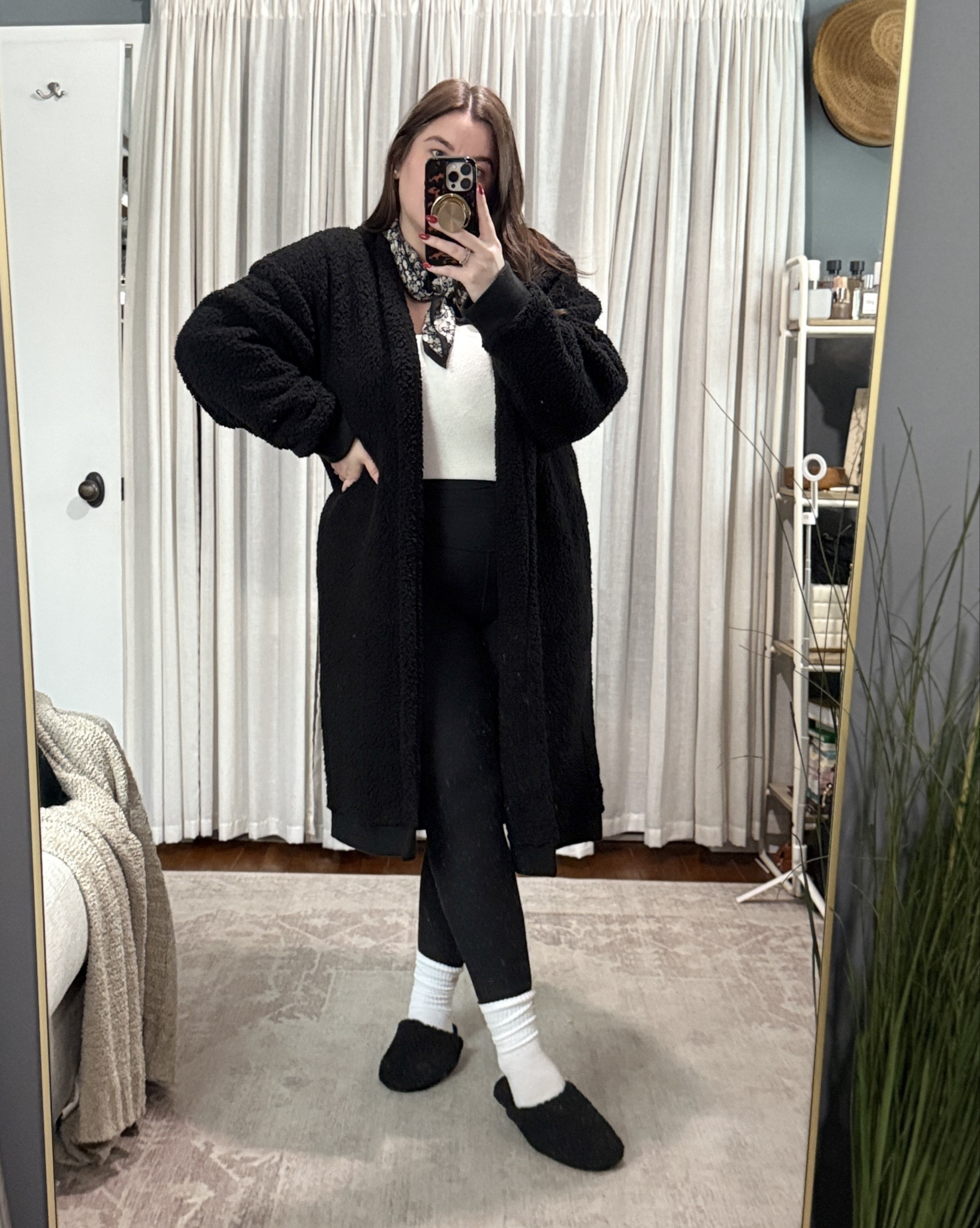 One of my go-to work-from-home outfit formulas: sherpa cardigan + double-lined tee + ribbed leggings. It looks effortless but feels like pajamas, and the sherpa adds texture on camera. Keeping everything in a clean black + white palette makes the look feel intentional (even from the couch).

Accessorize with pearl bow earrings, a bandana, and Bombas mules for cozy desk days — or swap for Adidas VL Court sneakers if you prefer real shoes while working.

Fit Notes
• Cardigan: size XL (oversized)
• Tee: size L (not sheer, smoothing)
• Leggings: size XL (true to size, ribbed)
• Slipper: size 9 (if you are a half size go up to the next size, I’m a 8/8.5)

Save this look to recreate later 👇

#LTKootd #LTKMidsize #LTKgrwm