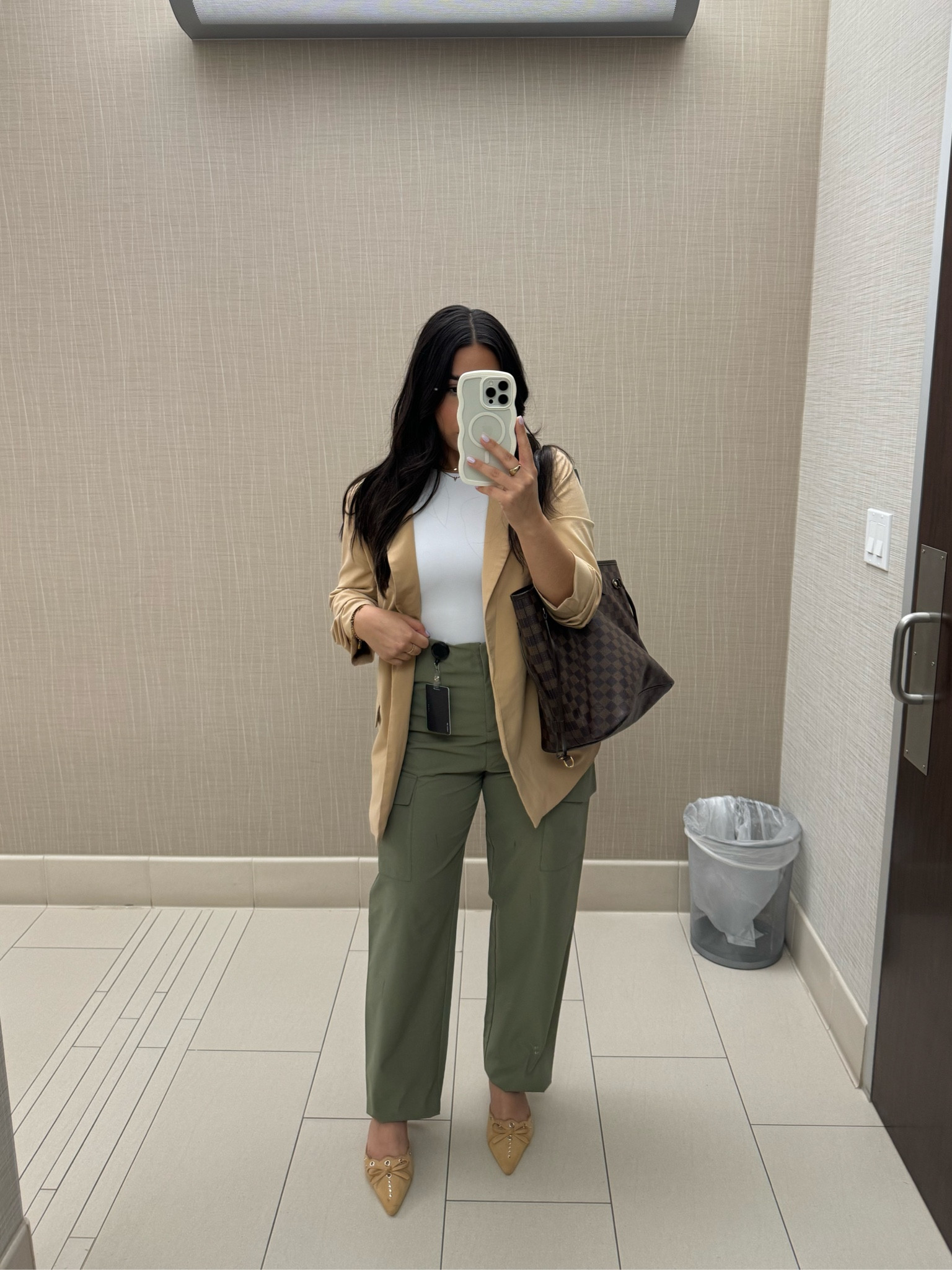 Casual office outfit idea 
High neck tank bodysuit: small
Green cargo pants: medium 
Khaki blazer: small 
Pointed toe heels: 6.5
Lv neverfull mm tote bag 

#LTKWorkwear #LTKStyleTip #LTKFindsUnder100
