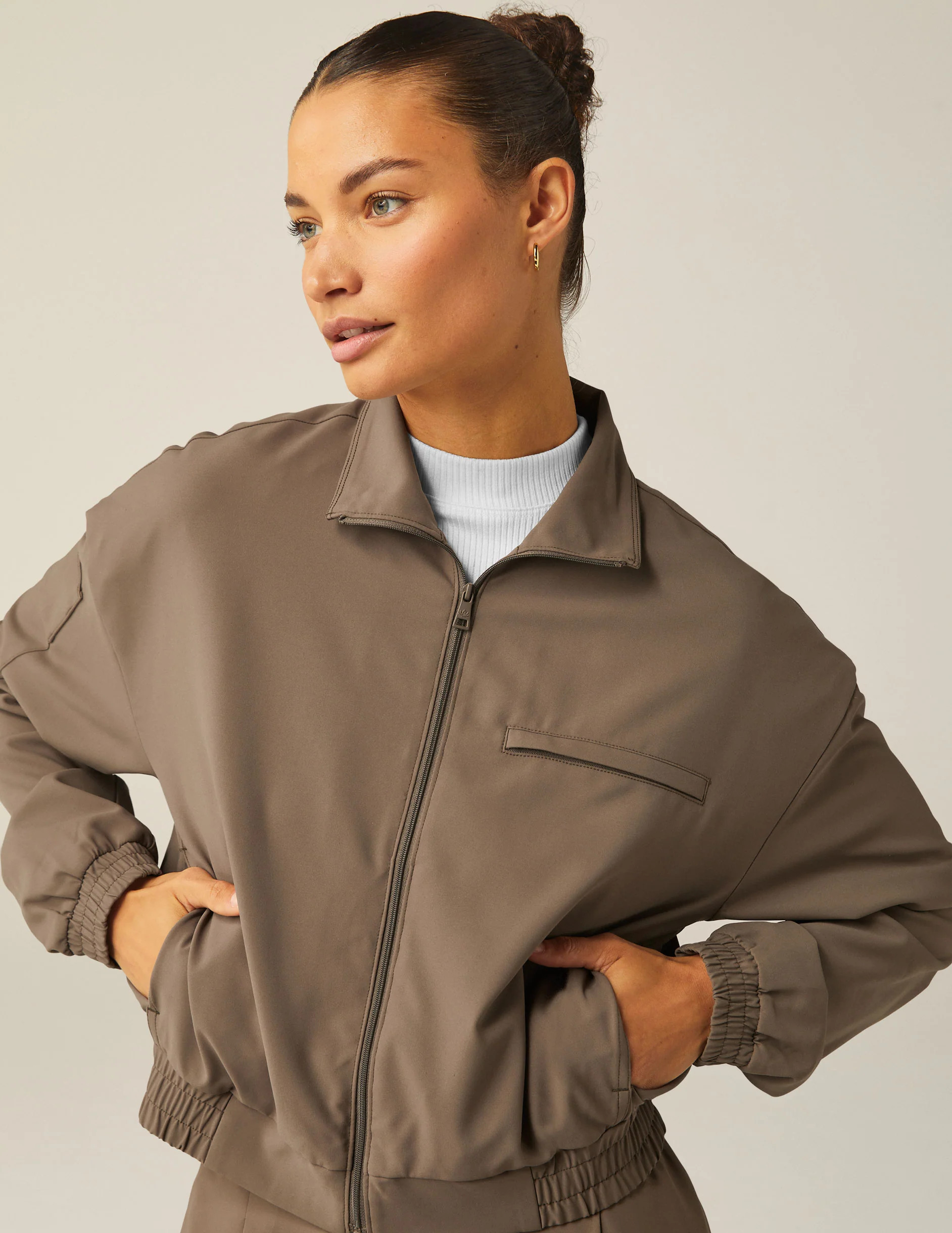 Status Pocket Sleeve Cropped Jacket | Beyond Yoga | Beyond Yoga