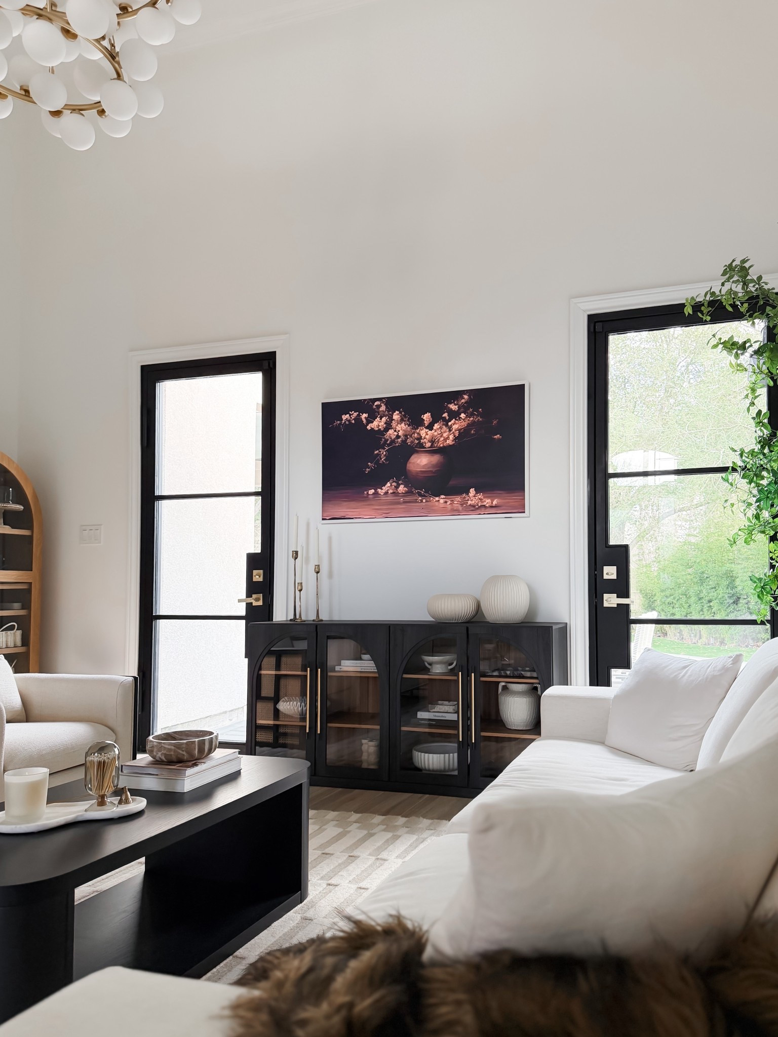 Switched out our old boho style cabinet for this Arhaus style one.  I love it! Under $400 

#LTKHome