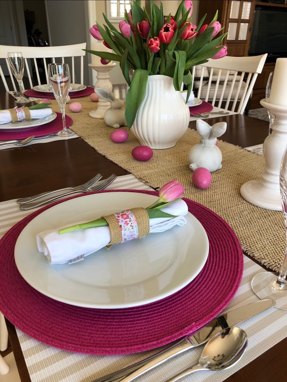 Easter table setting with bunnies, tulips and pops of pink!

#ltkeaster

#LTKHome #LTKSeasonal