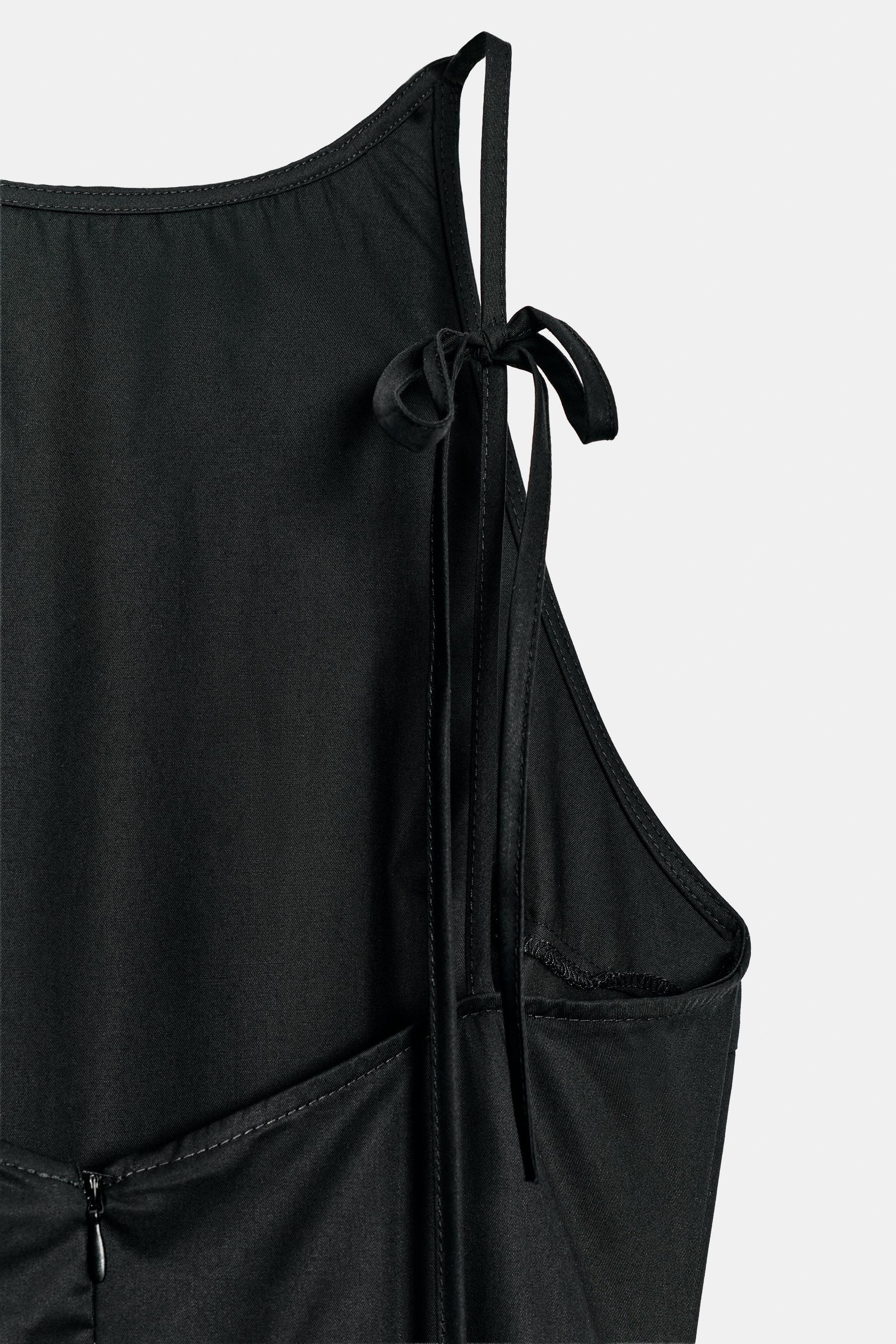 Straight-neck midi dress with spaghetti straps. Flounced hem. Back hidden in-seam zip closure. | Zara US