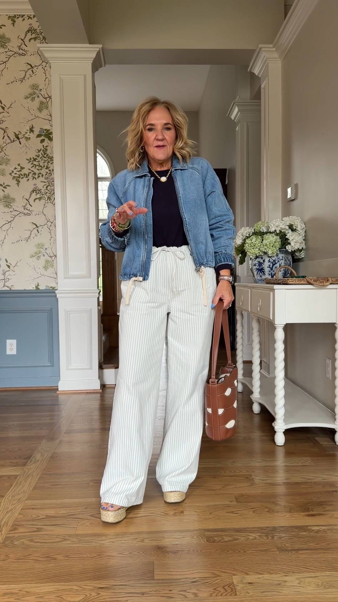 Walmart finds 
Jeans are loose. I think that’s how they’re suppose to fit. Wearing a medium 
Jacket medium. 
Will link similar navy top 

Drawstring jeans Walmart fashion. Denim bomber spring casual outfit 

#LTKMidsize #LTKOver40 #LTKSeasonal