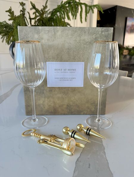 Wine glass gift set, ribbed fluted wine glass with gold trim, gold wine opener, 2 gold wine stoppers, Christmas gift, hostess gift, housewarming gift, white elephant gift

#LTKparties #LTKfindsunder50 #LTKGiftGuide