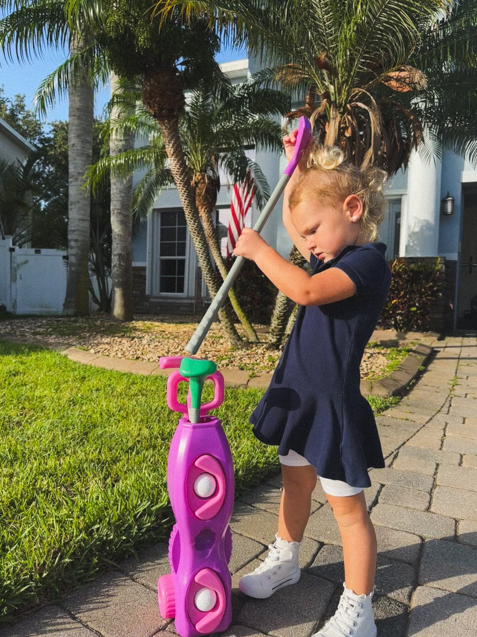 Practicing her swing before Father’s Day! Growing with her RL dress, we added biker shorts underneath! Love the ruffle socks with our Converse dupes. The golf set was found at TJMAXX! And the earrings are stick on pearls that made this look sweet and preppy  

#LTKFamily #LTKShoeCrush #LTKKids